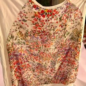 Long sleeve transparent floral top.